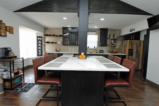 14306 Waterville Way, Houston, TX 77015 - kitchen with open shelves, high end refrigerator, plenty of natural light, a kitchen breakfast bar, and recessed lighting