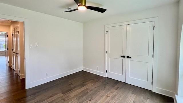 2823 Stetson Ln, Houston, TX 77043 - unfurnished bedroom featuring dark wood-type flooring, a closet, and a ceiling fan