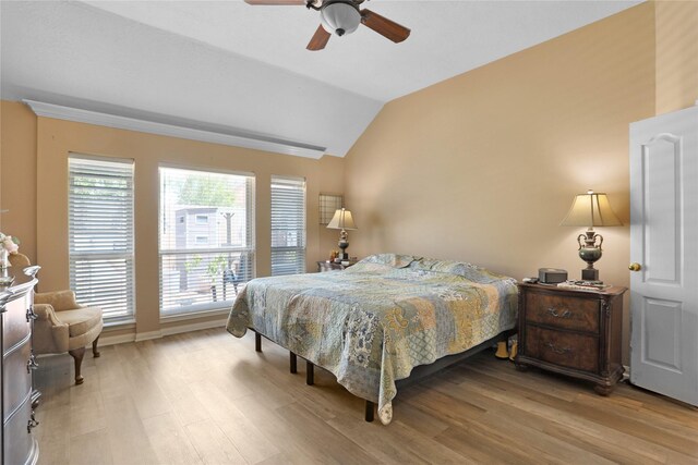 3816 Lake View Dr, Pearland, TX 77581 - bedroom featuring vaulted ceiling, wood finished floors, and a ceiling fan