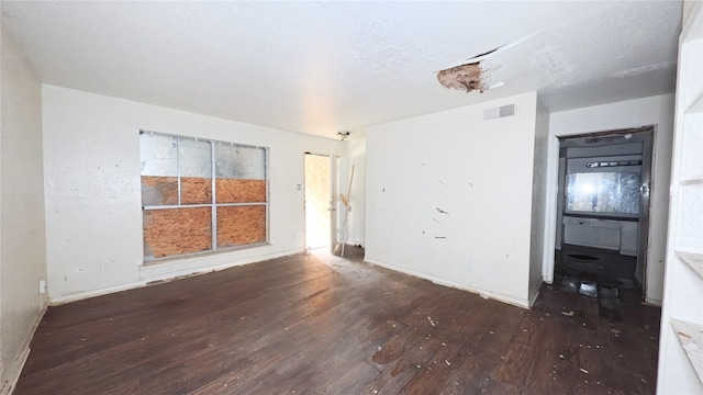 5625 Antoine Dr Unit 606, Houston, TX 77091 - spare room featuring wood finished floors and baseboards