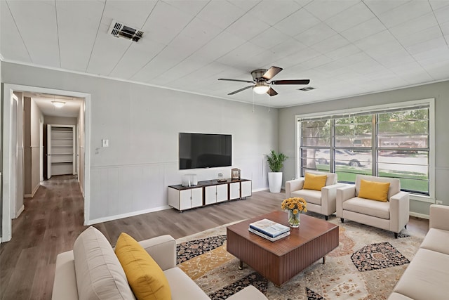 122 22nd Ave N, Texas City, TX 77590 - living area featuring ceiling fan and wood finished floors