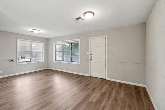 122 22nd Ave N, Texas City, TX 77590 - entrance foyer featuring wood finished floors and baseboards