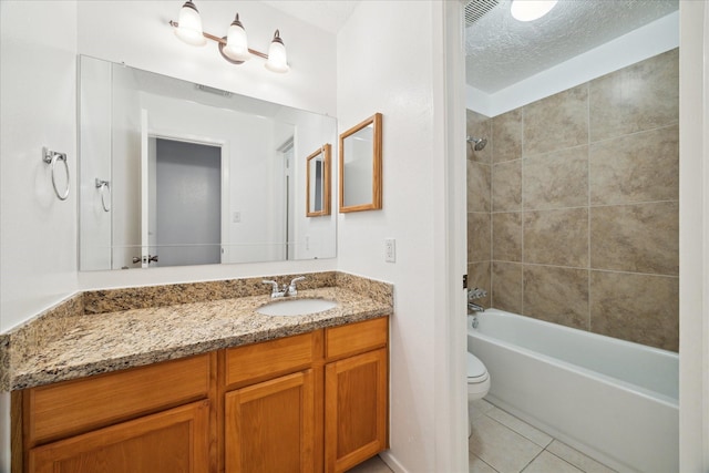 11311 Terrebone Dr, Cypress, TX 77429 - full bathroom with vanity, tile patterned flooring, shower / washtub combination, and a textured ceiling