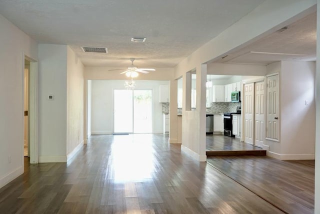 5010 Malmedy Rd, Houston, TX 77033 - unfurnished room with a ceiling fan and dark wood finished floors