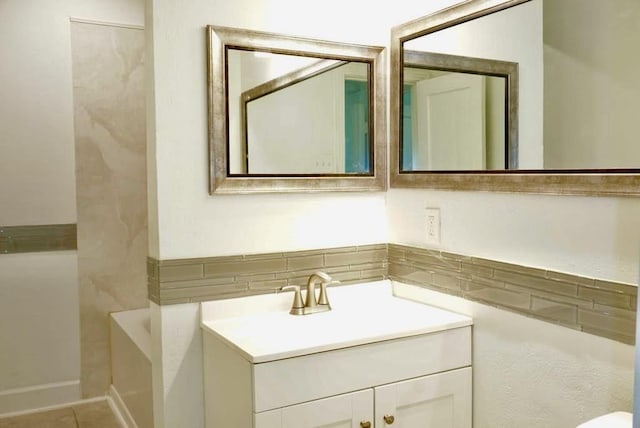 5010 Malmedy Rd, Houston, TX 77033 - bathroom with a tub, vanity, and tile patterned flooring