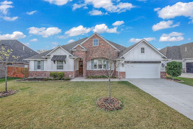 1929 Spanish Moss Dr, College Station, TX 77845 - view of front of home with board and batten siding, brick siding, concrete driveway, and a front yard
