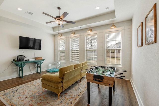 1929 Spanish Moss Dr, College Station, TX 77845 - rec room with wood finished floors, ceiling fan, recessed lighting, and a tray ceiling