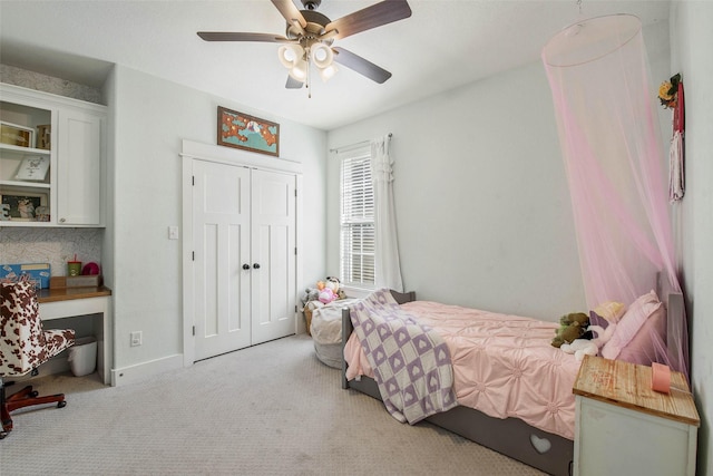 1929 Spanish Moss Dr, College Station, TX 77845 - carpeted bedroom featuring an office area, a closet, and a ceiling fan