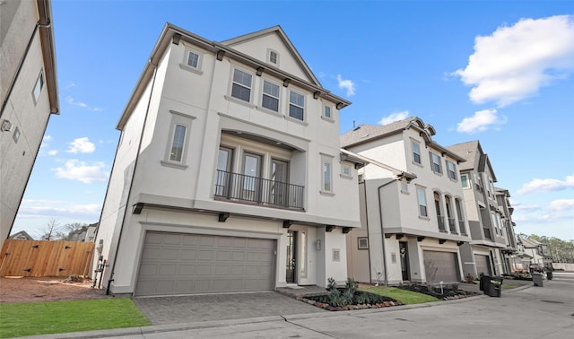 10609 Centre Green Way, Houston, TX 77043 - multi unit property featuring stucco siding, a residential view, and a garage