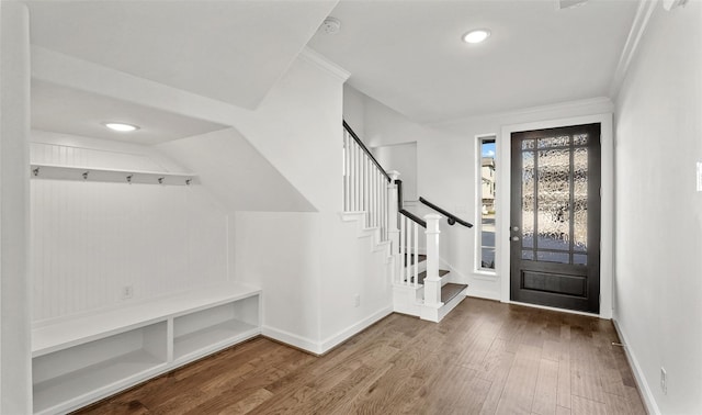 10609 Centre Green Way, Houston, TX 77043 - mudroom featuring wood finished floors, ornamental molding, and recessed lighting