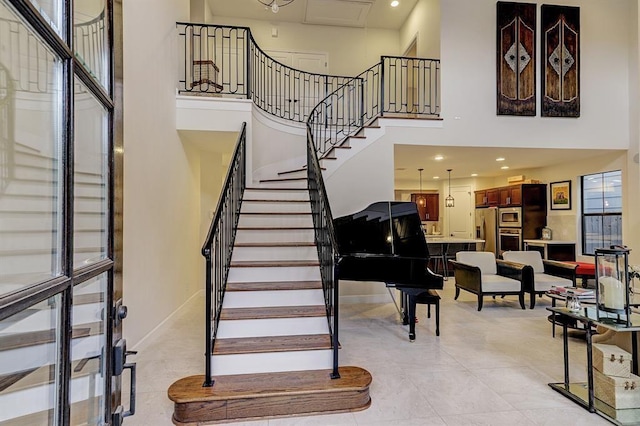 2514 Detering St, Houston, TX 77007 - stairs with a high ceiling and recessed lighting