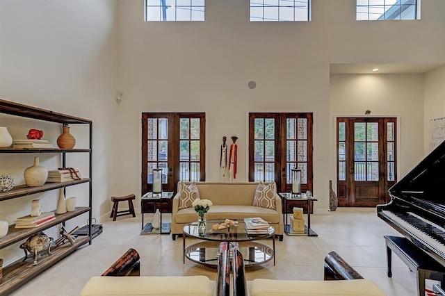 2514 Detering St, Houston, TX 77007 - living area with french doors, a high ceiling, and light tile patterned floors
