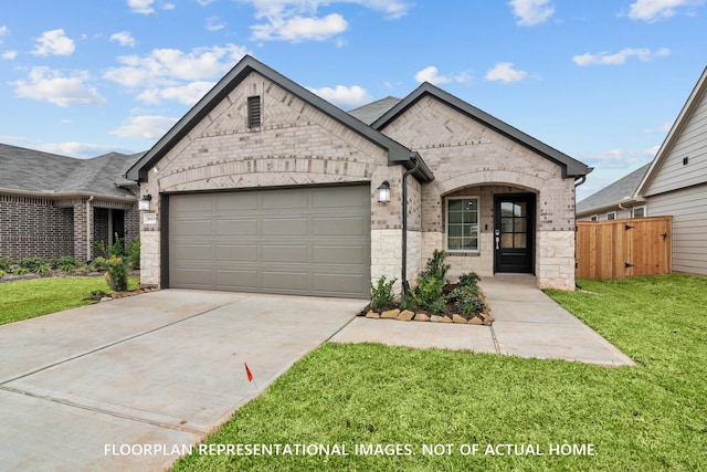 20626 Draper Rd, Tomball, TX 77377 - french country home featuring a garage, stone siding, concrete driveway, and brick siding