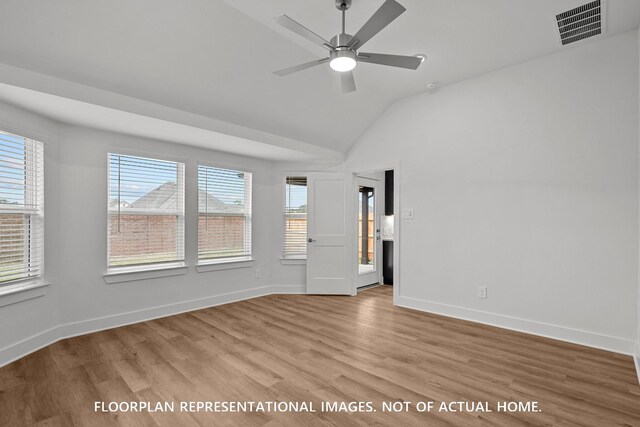 20626 Draper Rd, Tomball, TX 77377 - unfurnished bedroom with vaulted ceiling and light wood-type flooring