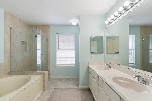 7015 Redwood Falls Dr, Pasadena, TX 77505 - full bath featuring a stall shower, double vanity, a garden tub, and tile patterned floors