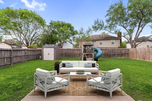 7015 Redwood Falls Dr, Pasadena, TX 77505 - fenced backyard with a shed, an outdoor living space, and a playground