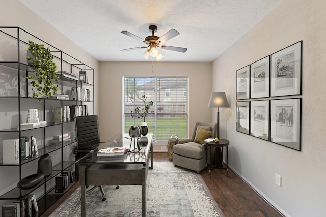 7015 Redwood Falls Dr, Pasadena, TX 77505 - office area featuring wood finished floors, ceiling fan, and a textured ceiling