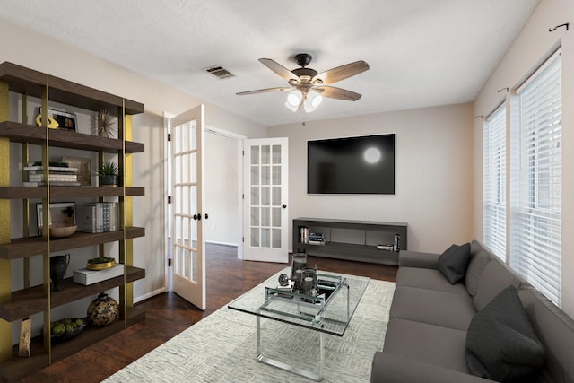 7015 Redwood Falls Dr, Pasadena, TX 77505 - living area featuring french doors, a ceiling fan, and wood finished floors