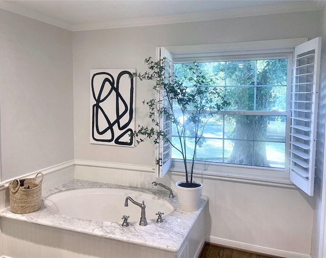 142 Beverly Ln, Bellaire, TX 77401 - bathroom with a garden tub, healthy amount of natural light, and ornamental molding