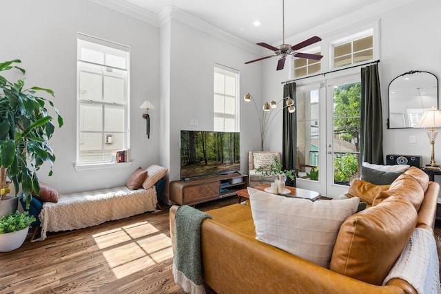 5658 Darling St, Houston, TX 77007 - living room with crown molding, a ceiling fan, wood finished floors, and recessed lighting