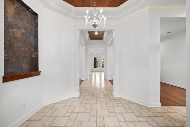 3118 Rosemary Park Ln, Houston, TX 77082 - hall featuring stone tile floors, crown molding, a chandelier, a tray ceiling, and wood ceiling