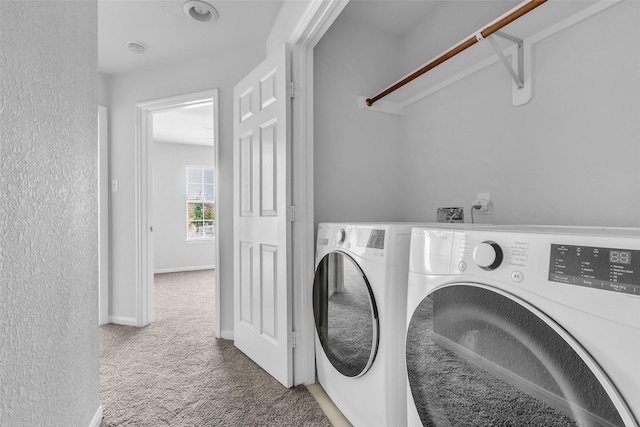 2223 Ridge Wood Ln, Sugar Land, TX 77479 - laundry room with carpet floors and separate washer and dryer