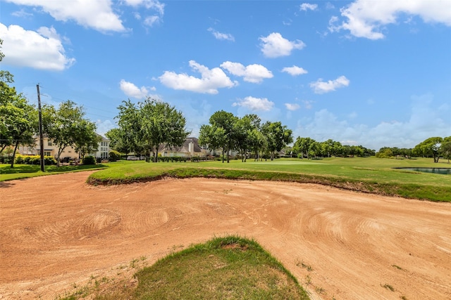 2223 Ridge Wood Ln, Sugar Land, TX 77479 - view of community with golf course view and a yard