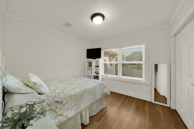 1931 Ansbury Dr, Houston, TX 77018 - bedroom with ornamental molding and wood finished floors