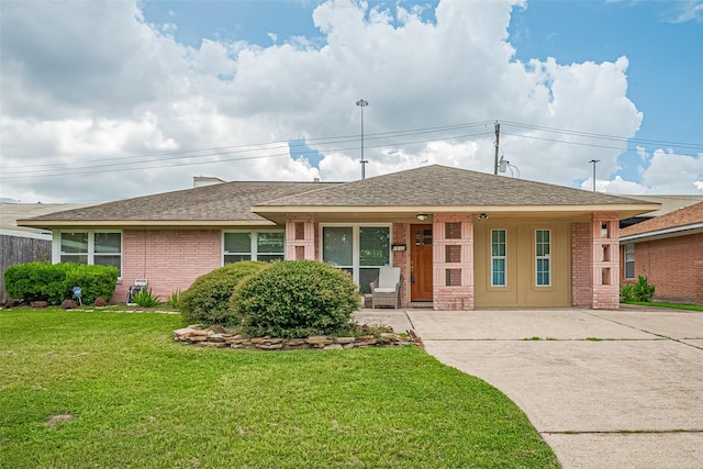 1931 Ansbury Dr, Houston, TX 77018 - view of front of home with brick siding, covered porch, and a front yard