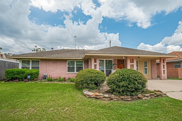 1931 Ansbury Dr, Houston, TX 77018 - ranch-style house featuring brick siding, driveway, and roof with shingles