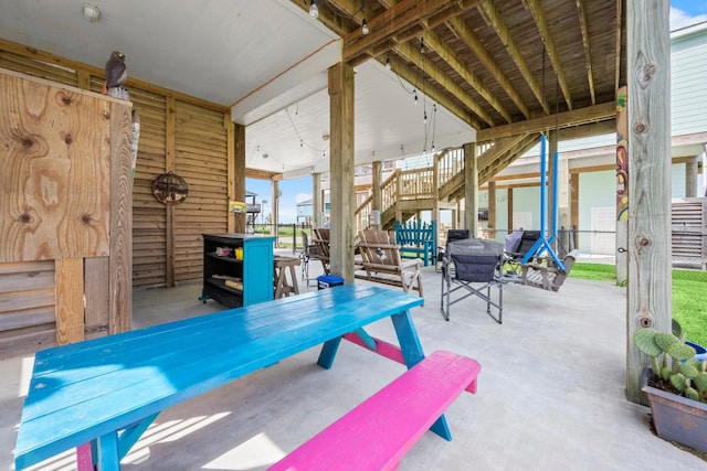 3292 Hidden Gold Prt, Bolivar, TX 77650 - view of patio / terrace with outdoor dining area and stairway