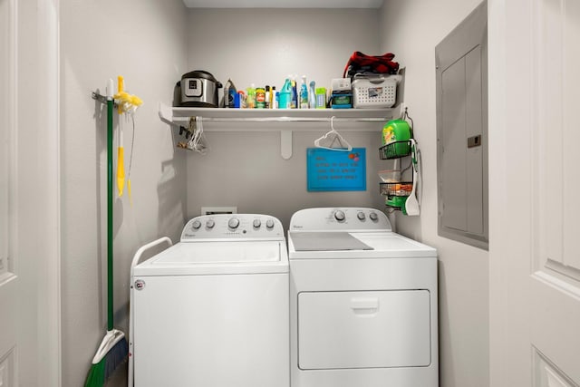 3292 Hidden Gold Prt, Bolivar, TX 77650 - laundry room featuring washing machine and clothes dryer and electric panel