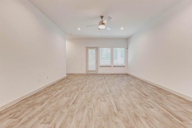 3026 Stock Orchard Ln, Houston, TX 77047 - empty room with a ceiling fan, light wood finished floors, and recessed lighting