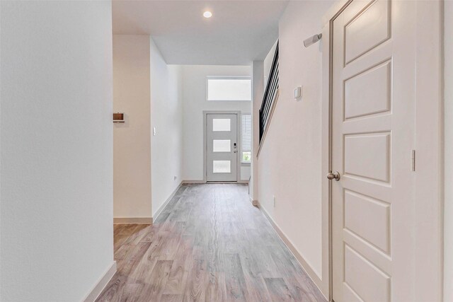 3026 Stock Orchard Ln, Houston, TX 77047 - hallway with light wood finished floors and recessed lighting