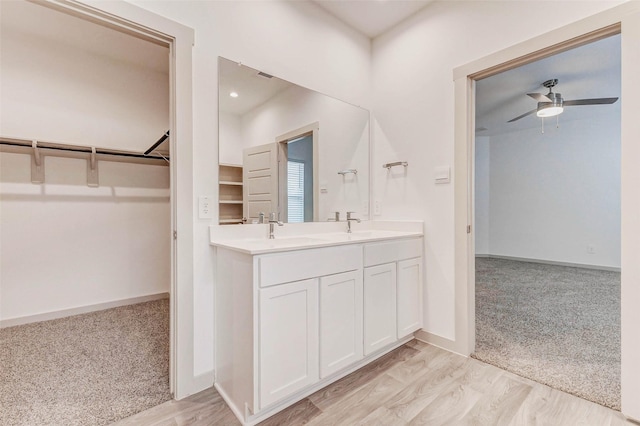3026 Stock Orchard Ln, Houston, TX 77047 - bathroom with double vanity, a spacious closet, and ceiling fan