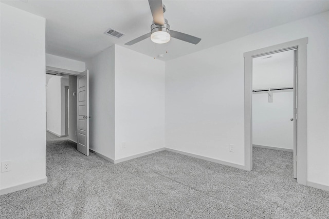 3026 Stock Orchard Ln, Houston, TX 77047 - unfurnished bedroom featuring carpet flooring, a walk in closet, ceiling fan, and a closet