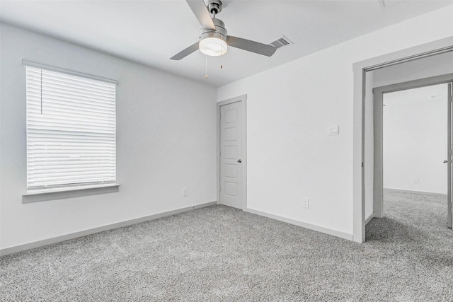 3026 Stock Orchard Ln, Houston, TX 77047 - unfurnished bedroom featuring carpet and a ceiling fan