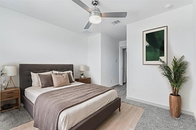 3026 Stock Orchard Ln, Houston, TX 77047 - bedroom featuring a ceiling fan and light wood-style floors