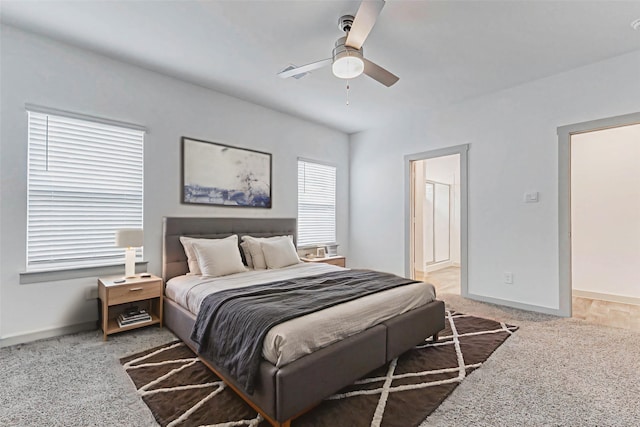 3026 Stock Orchard Ln, Houston, TX 77047 - carpeted bedroom with baseboards and ceiling fan