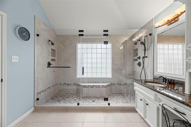 9618 Roarks Psge, Missouri City, TX 77459 - bathroom featuring vaulted ceiling, vanity, a shower stall, tile patterned flooring, and plenty of natural light