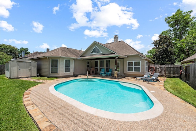 9618 Roarks Psge, Missouri City, TX 77459 - view of pool featuring a patio area, a fenced backyard, and a shed