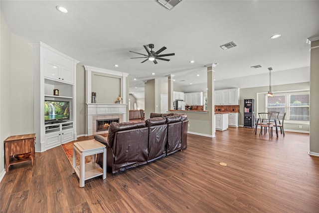 9618 Roarks Psge, Missouri City, TX 77459 - living area with a ceiling fan, a tile fireplace, recessed lighting, and dark wood finished floors
