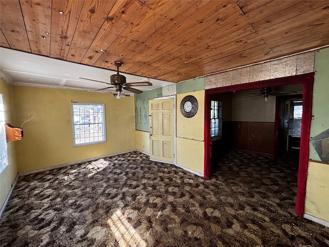 4124 Dabney St, Houston, TX 77026 - carpeted spare room with a ceiling fan and wood ceiling