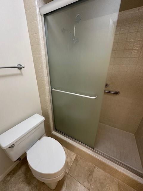 40 N Interstate 35 Unit 3D3, Austin, TX 78701 - bathroom with a shower stall and tile patterned floors