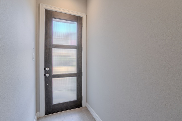 11016 Crescent Light Way, Houston, TX 77043 - doorway to outside with baseboards