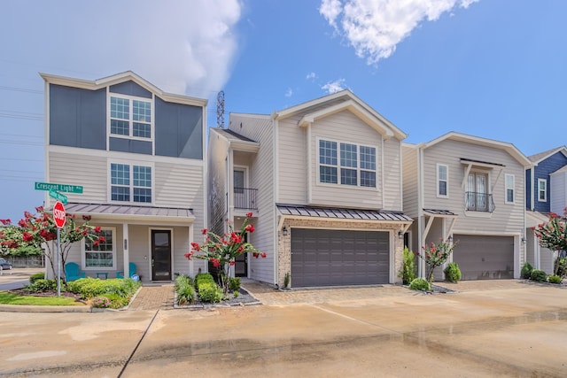 11016 Crescent Light Way, Houston, TX 77043 - multi unit property with a standing seam roof, an attached garage, a metal roof, and concrete driveway