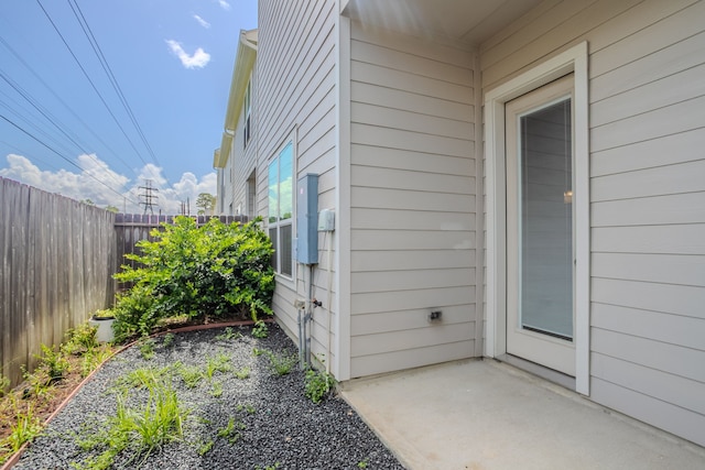 11016 Crescent Light Way, Houston, TX 77043 - doorway to property featuring a patio area