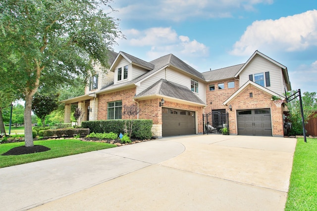 9303 Georgetown Glen Cir, Cypress, TX 77433 - view of front of property with brick siding, driveway, a garage, and a shingled roof