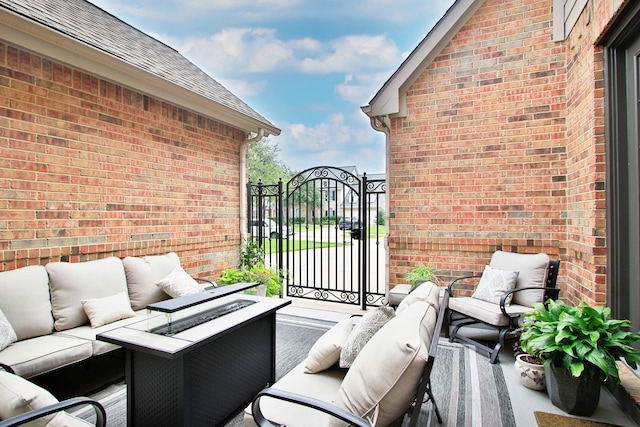 9303 Georgetown Glen Cir, Cypress, TX 77433 - view of patio with an outdoor living space with a fire pit and a gate