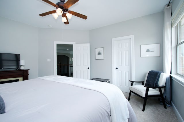 9303 Georgetown Glen Cir, Cypress, TX 77433 - carpeted bedroom featuring a ceiling fan and baseboards